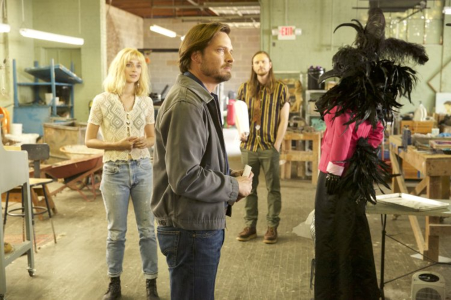 Caitlin Fitzgerald, Aden Young, Joshua Mikel and a mysterious bird wearing a dress, in Rectify