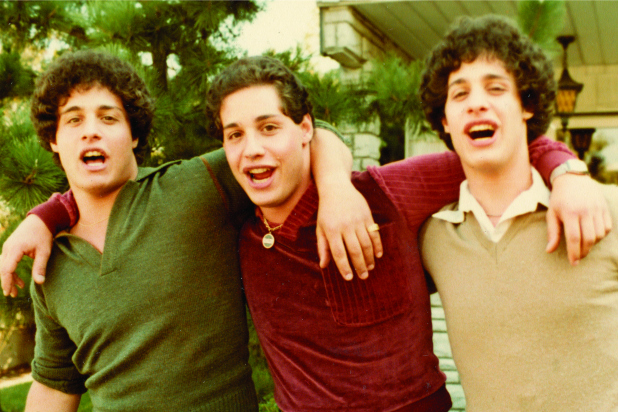 Three Identical Strangers